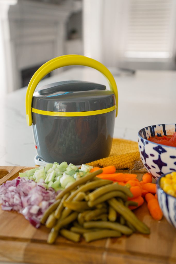 A Portable Healthy Hot Lunch To Take Anywhere Crockpot™ Mini Portable Lunch Carrier. This mini personal food warmer doesn't just keep our food warm, it lets us heat up our food wherever we are